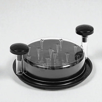 Appareil SkyGrip noir avec picots, accessoire innovant sur fond blanc